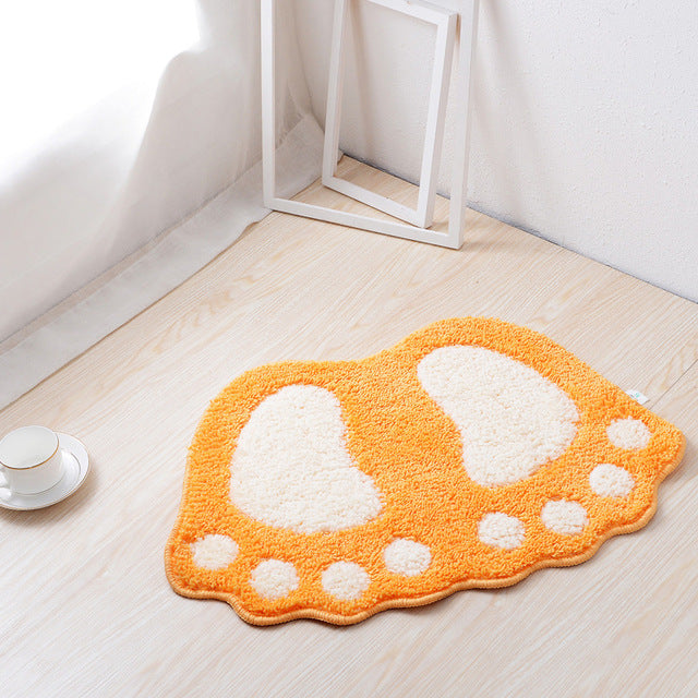 tapis de bain en forme de pied orange