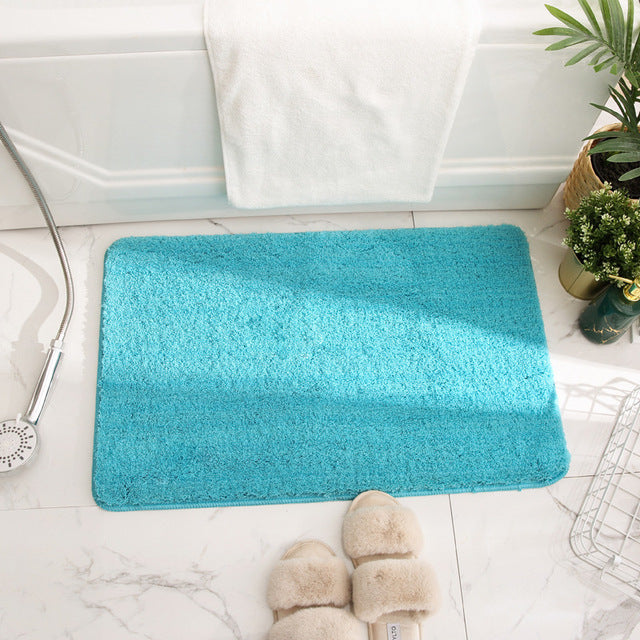 Tapis de bain turquoise