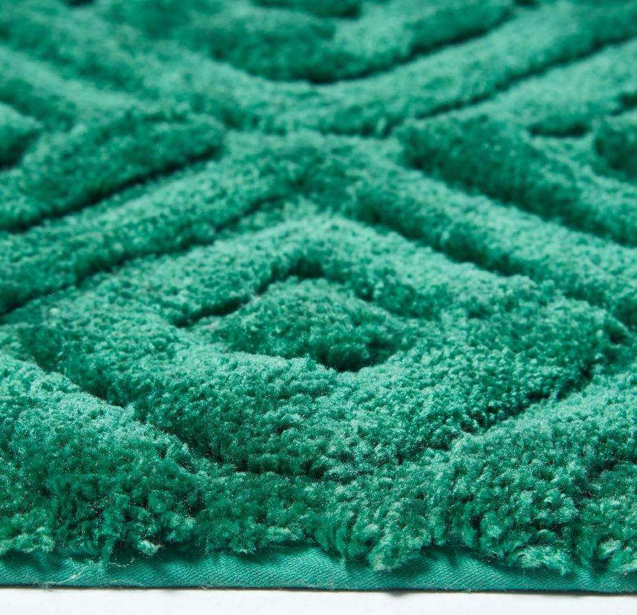 Tapis salle de bain vert émeraude avec des losanges