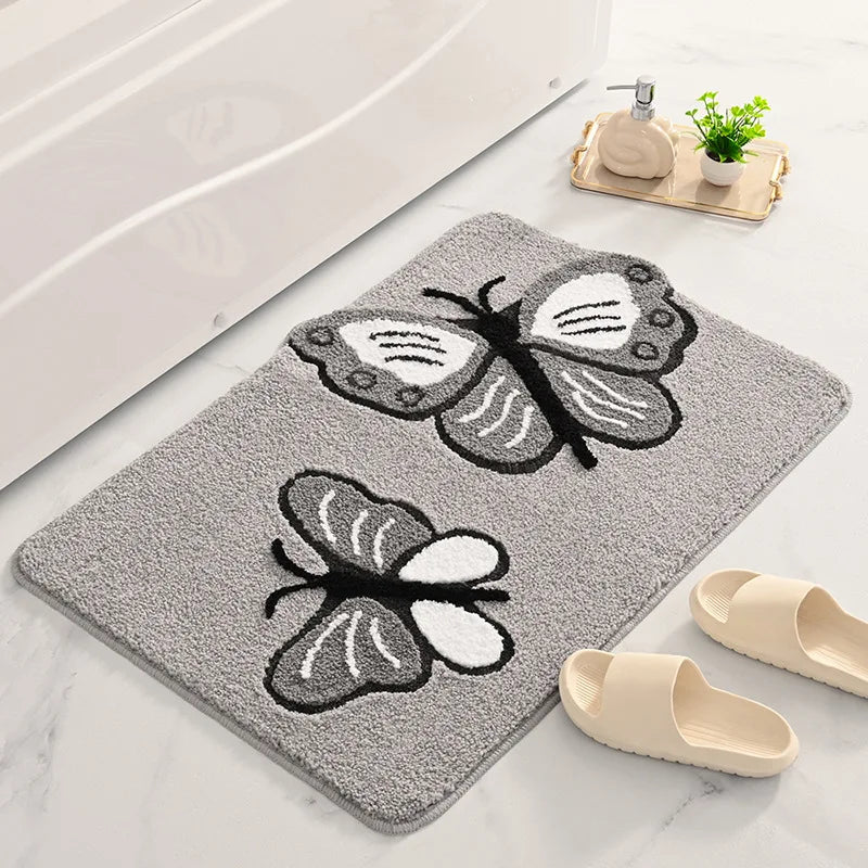 Tapis de bain papillon gris