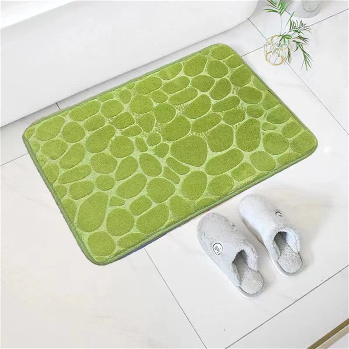 Tapis de bain mémoire de forme galet vert