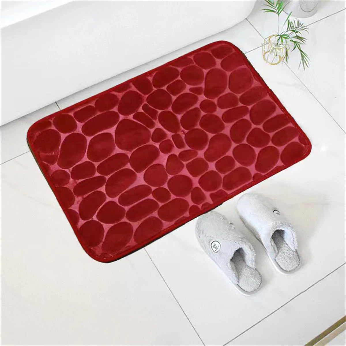 Tapis de bain mémoire de forme galet ROUGE