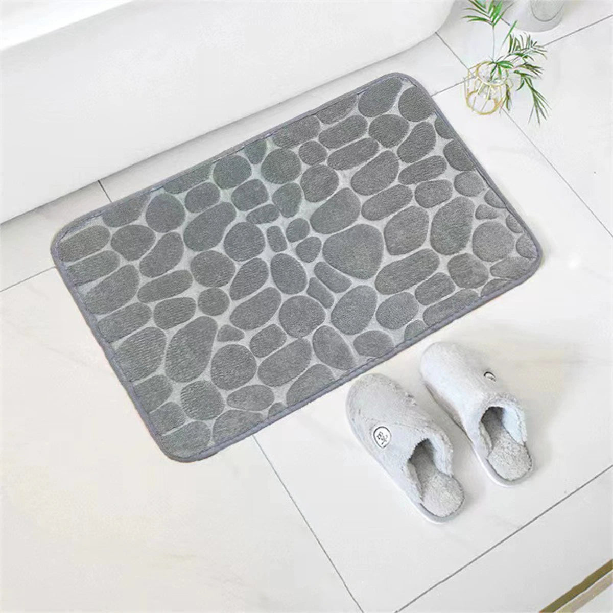 Tapis de bain mémoire de forme galet gris