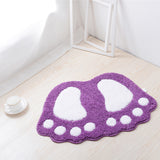 tapis de bain en forme de pied violet