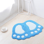 tapis de bain en forme de pied bleu